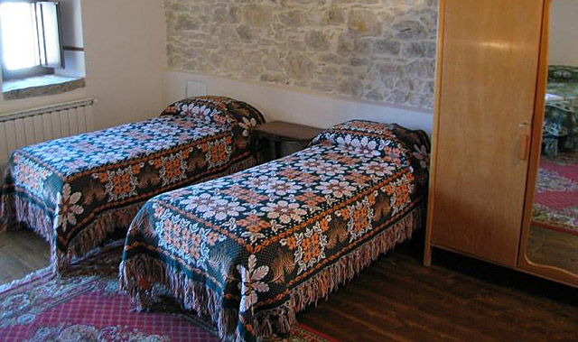 A bedroom with two beds